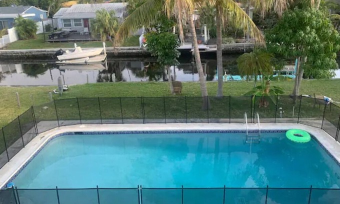 Tarpon River Casa | Waterfront Zebra styled Black & White villa w pool !!!