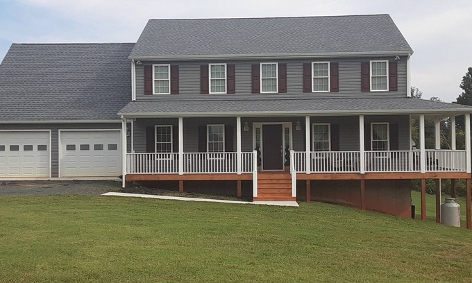 Madison Heights Casa | Welcome Home! New luxurious home awaits - large family room w/ fireplace.