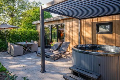 Stieltjeskanaal Apartamento | Wellnesslodge Scholekster met jacuzzi en uitzicht