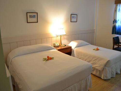 Koror Hotel | West Plaza Downtown