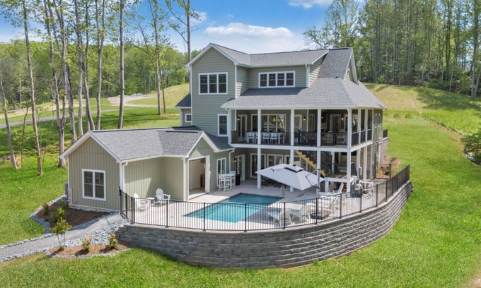 Moneta Casa | Whispering Pines Estate, Waterfront Luxury w/ Covered Verandas + Heated Salt Pool, Hot Tub, Dock!
