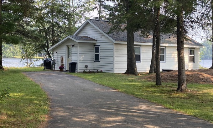Rhinelander Cabaña | WI River-Boom Lake cottage on spacious lot, water on 3 sides, kayaks, fire pit