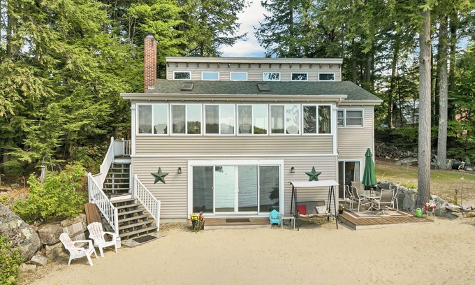 Moultonborough Casa | Winnipesaukee Lake Front Cottage with Sandy Beach and 25ft Dock Sleeps 8