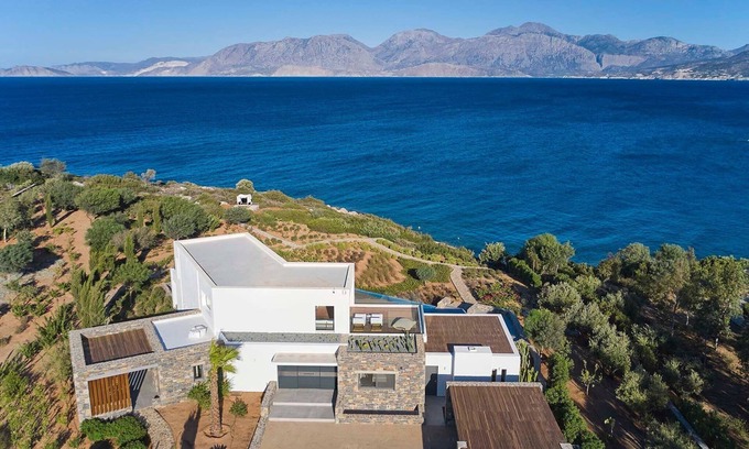 Ammoudara Villa | Wonderful Crete Villa | Seafront Villa Seraphis | 6 Bedrooms | Private Heated Pool | Fitness Area & Cinema Room | Outdoor Dining Area & BBQ | Direct Access to Rocky Beach | Agios Nikolaos
