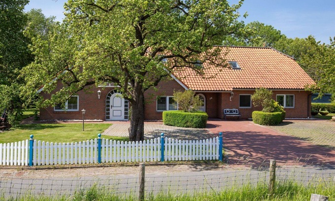 Butjadingen Casa | Preciosa casa de vacaciones privada con WIFI, TV, terraza, mascotas permitida y aparcamiento