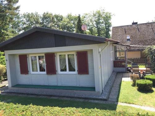 Waldsiedlung Romerstraße Casa | Wooden holiday home with winter garden