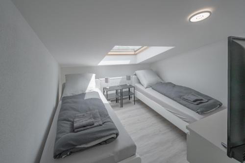 Villingen-Schwenningen Apartamento | WORK&SLEEP Moderne Apartments in Villingen Schwenningen - Einzelbetten, TV, Bettwäsche & Handtücher, WLAN