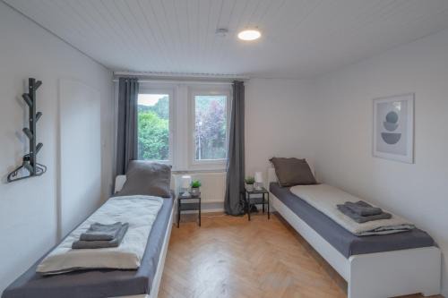 Oberndorf am Neckar Apartamento | WORK&SLEEP - moderne Apartments mit Einzelbetten, TV, WLAN, Bettwäsche und Handtücher