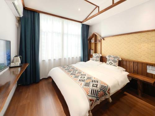 Yongding Casa | Xiaobeilou B&B Zhangjiajie Railway Station Tianmen Mountain Cableway Branch