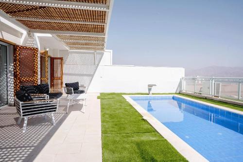 Eilat Apartamento | YalaRent Suff mountains- Garden apartment with private pool