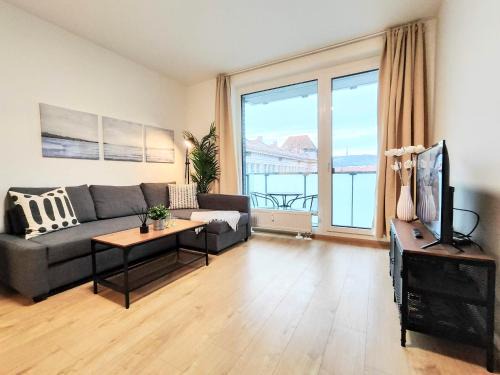 Nivy Apartamento | Yarn - brand new - free parking - balcony with city view - Central shopping mall