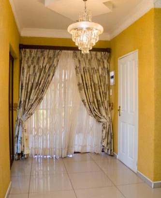 Mbabane Cama Y Desayuno | Yellow Rose B&B