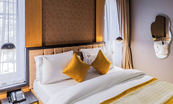 Wuse 2 Hotel | Yellow trumpet wuse