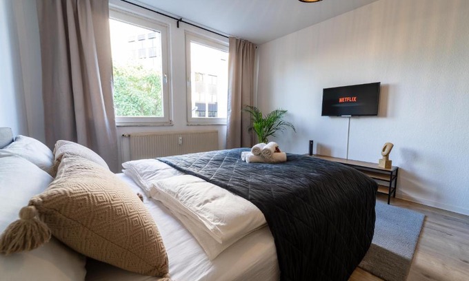 Suedviertel Apartamento | Zentral & Modern nahe Hauptbahnhof mit Privatparkplatz & schnellem WLAN