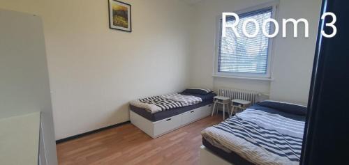 Leverkusen Apartamento | Zimmer 3 von 3 mit Gemeinschaftsbad-Küche, 30min Köln Messe Bahnhof, 5min Leverkusen Bahnhof Zentrum