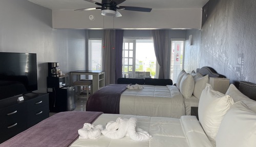 Habitación Deluxe, 2 camas de matrimonio, Aire acondicionado, vistas al mar