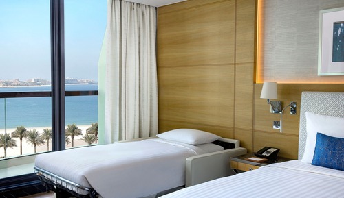 Grand Deluxe Room with King Bed and Partial Sea View  Private Balcony, Direct Access to Beach