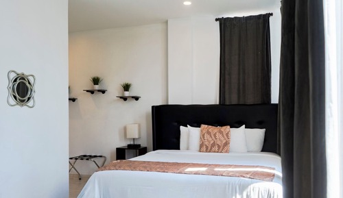 Suite Deluxe, 1 cama de matrimonio grande, no fumadores, Aire acondicionado