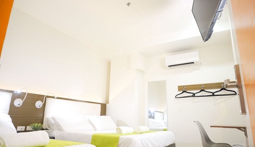 Habitación triple Deluxe