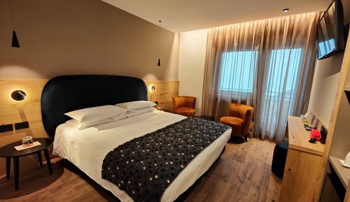 Habitación superior con 1 cama doble o 2 individuales