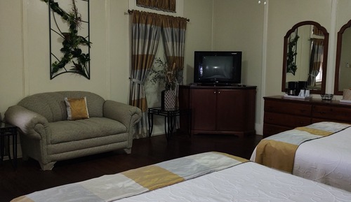 Habitación Deluxe, 2 camas de matrimonio, balcón, vistas parciales al mar