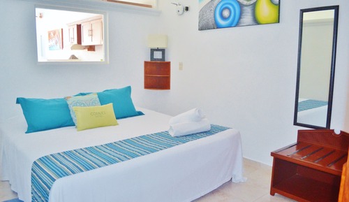 Suite familiar, 2 habitaciones, vistas parciales al mar