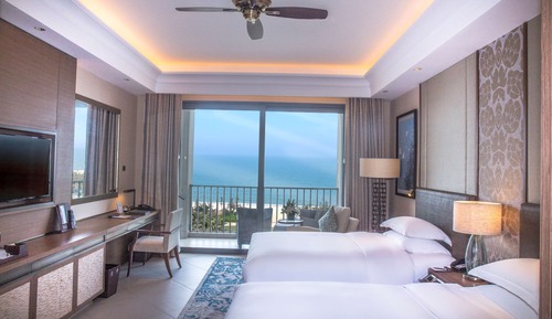 Habitación ejecutiva con 2 camas individuales, acceso al Business Lounge, vistas al mar