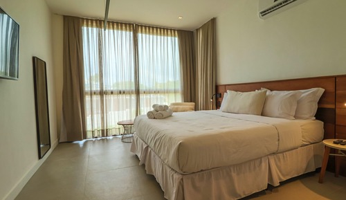 Habitación triple Deluxe, planta baja