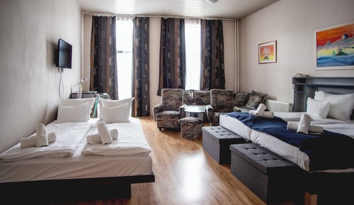 Habitación junior con 1 cama doble o 2 individuales