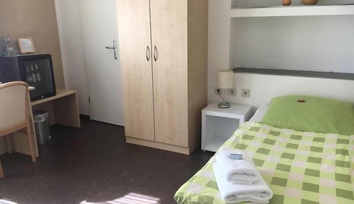 Habitación cuádruple, varias camas