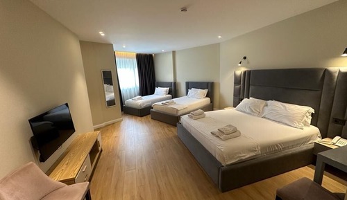 Habitación cuádruple Deluxe, vistas a la ciudad