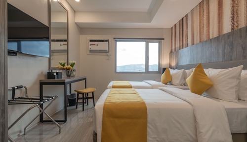 Habitación ejecutiva con 1 cama doble o 2 individuales