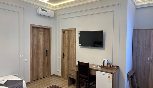 Habitación triple Deluxe