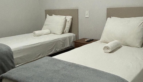Habitación estándar con 1 cama doble o 2 individuales