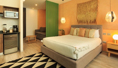Suite estudio de diseño, 1 cama de matrimonio, acceso a la piscina, vistas a la ciudad