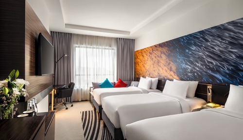 Habitación triple familiar, varias camas