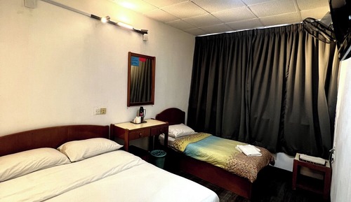 Habitación triple Deluxe