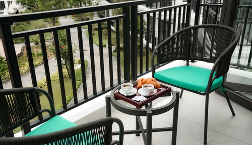 Habitación Premier con 1 cama doble o 2 individuales, vistas al jardín