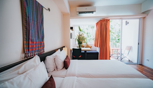 Habitación Deluxe con 1 cama doble o 2 individuales