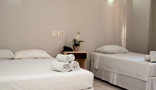 Habitación triple Deluxe, varias camas