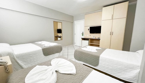 Habitación cuádruple Deluxe, varias camas