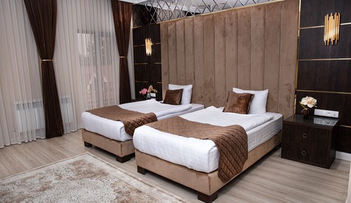 Habitación de lujo con 1 cama doble o 2 individuales