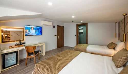 Habitación triple Deluxe