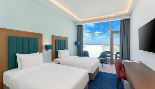 Habitación Deluxe con 2 camas individuales, balcón, vistas al mar