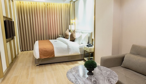 Habitación Deluxe, 1 cama de matrimonio grande con sofá cama