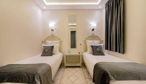 Habitación de lujo con 2 camas individuales