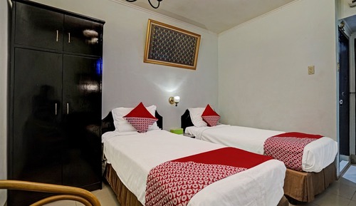 Habitación con 2 camas individuales