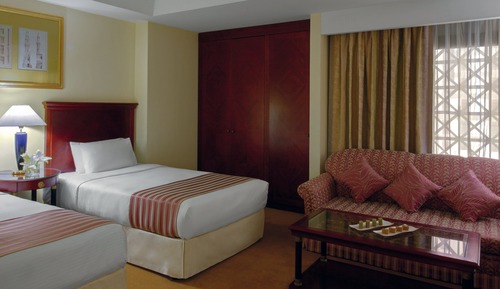 Suite, varias camas, en esquina