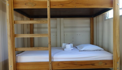Habitación familiar, varias camas, baño privado, junto a la playa