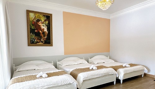 Habitación triple familiar, varias camas